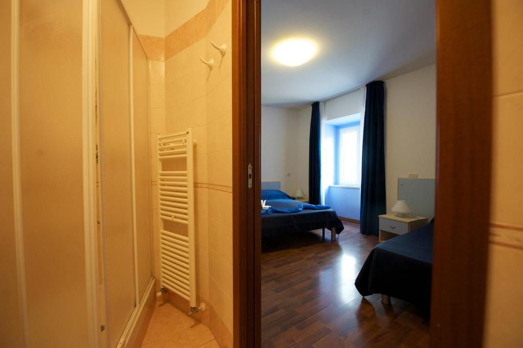 Hotel La Bussola Múggia Pokoj fotografie