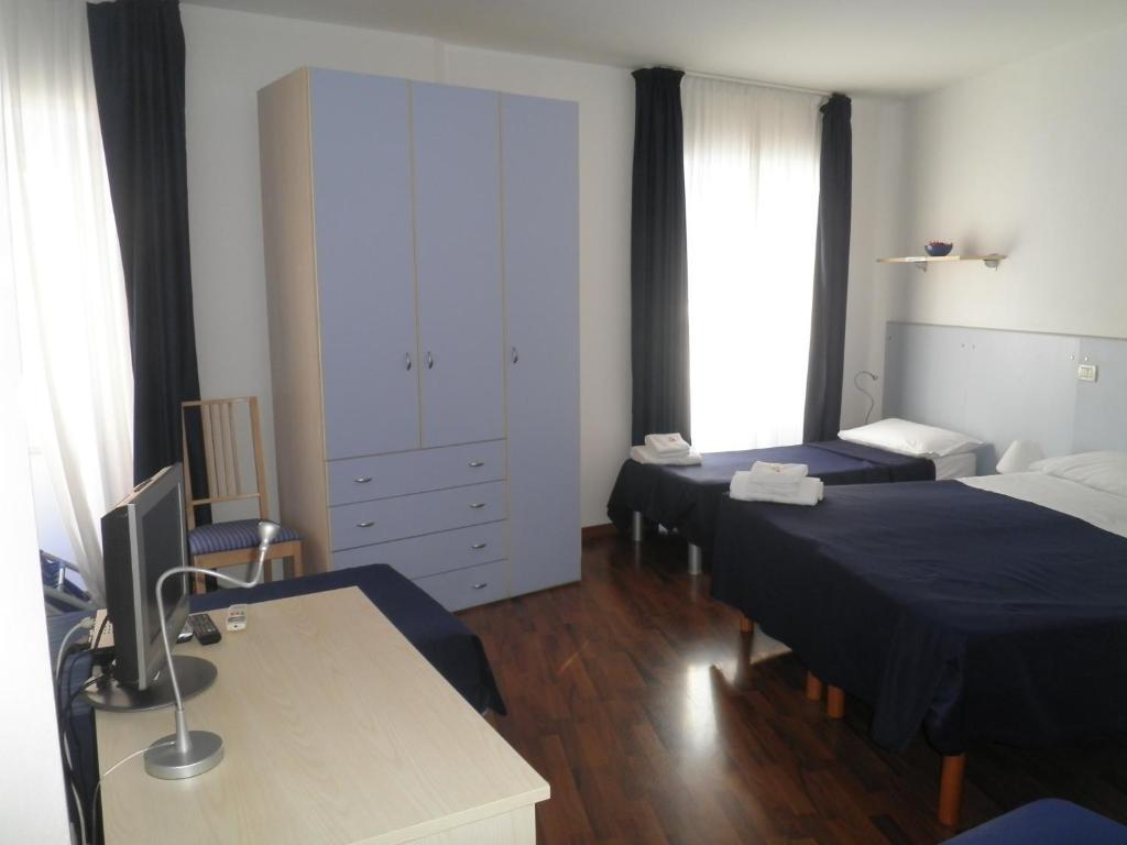 Hotel La Bussola Múggia Pokoj fotografie